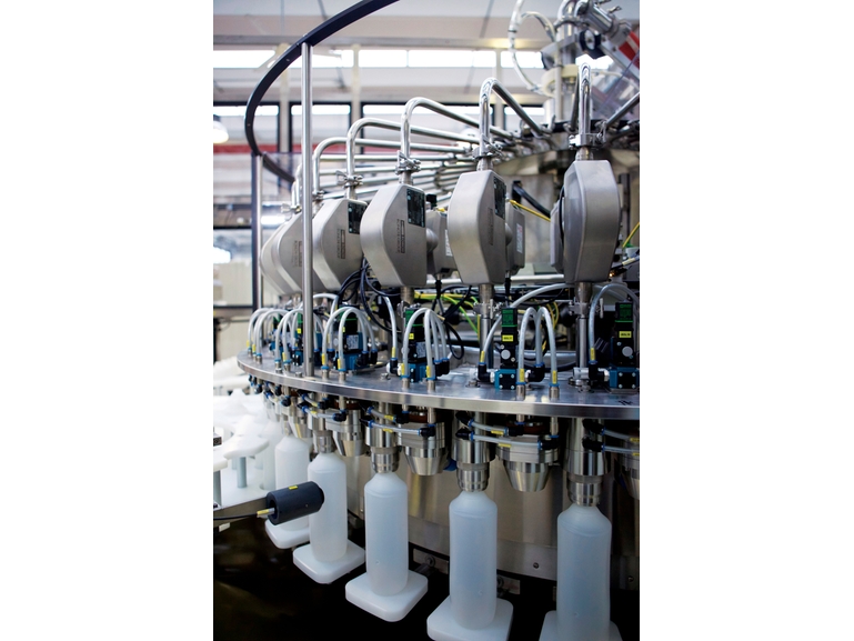 several Coriolis flowmeters from Endress+Hauser mounted in a filling application