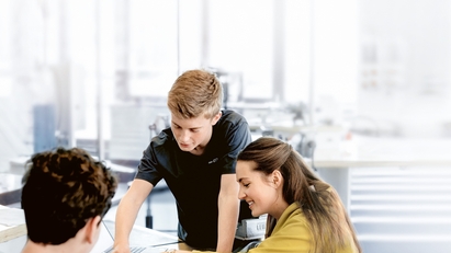 Three apprentices at work