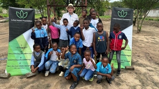 Celebrating the handover of the new well to Hibemandla Primary School in Lillydale, South Africa. 