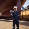 Chase Dwyer, CEO and founder of Carbon Ridge, in front of a tanker